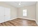 Bedroom features a ceiling fan, a window and a closet at 609 Rosemore Pl, Rock Hill, SC 29732