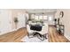 Elegant dining area adjacent to modern kitchen with hardwood floors at 609 Rosemore Pl, Rock Hill, SC 29732