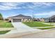 Brick home with a spacious garage and a well-maintained lawn on a sunny day at 609 Rosemore Pl, Rock Hill, SC 29732