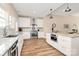 Kitchen showcasing a stainless steel oven, light countertops, and wood flooring at 609 Rosemore Pl, Rock Hill, SC 29732