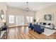 Spacious living room with ample seating and hardwood floors at 609 Rosemore Pl, Rock Hill, SC 29732
