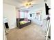 Bright bedroom featuring a comfortable daybed, ceiling fan and natural light from the window at 719 Mountain Quail Dr # 34, Charlotte, NC 28216