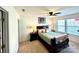 Cozy bedroom featuring carpet flooring, a ceiling fan, and natural light at 719 Mountain Quail Dr # 34, Charlotte, NC 28216