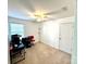 Bedroom with a ceiling fan, natural light, and a versatile layout for a home office at 719 Mountain Quail Dr # 34, Charlotte, NC 28216