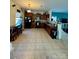 View of the kitchen with wood cabinets, a breakfast bar, and ample space for cooking and dining at 719 Mountain Quail Dr # 34, Charlotte, NC 28216