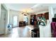 Open kitchen with tile flooring, dark cabinets, breakfast bar and plenty of natural light at 719 Mountain Quail Dr # 34, Charlotte, NC 28216