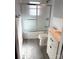 Bathroom with shower/tub combo, modern vanity, and tile floors at 723 S Confederate Ave, Rock Hill, SC 29730