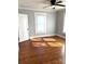 Spacious bedroom with hardwood floors, ceiling fan, and natural light at 723 S Confederate Ave, Rock Hill, SC 29730