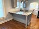 Modern kitchen island features granite countertops and stainless steel appliances at 723 S Confederate Ave, Rock Hill, SC 29730