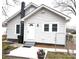 Charming home with white siding, black chimney, covered entry, and landscaping at 723 S Confederate Ave, Rock Hill, SC 29730