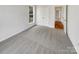 Empty bedroom with neutral walls and carpets, and natural light at 7400 Gilead Rd, Huntersville, NC 28078