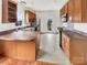 Functional kitchen with stainless steel appliances and hardwood flooring at 7400 Gilead Rd, Huntersville, NC 28078
