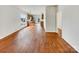 Spacious living room with hardwood floors and views to the kitchen at 7400 Gilead Rd, Huntersville, NC 28078