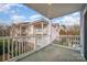 Spacious balcony featuring white railings and views of the surrounding community at 8629 Coralbell Ln, Charlotte, NC 28213