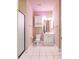 Compact bathroom featuring tile flooring, shower, white cabinets, and neutral walls at 8923 Meadow Vista Rd, Charlotte, NC 28213