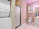 A cozy bathroom featuring shower, white cabinets, and neutral walls at 8923 Meadow Vista Rd, Charlotte, NC 28213