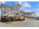 Low-angle view of a well-maintained home featuring an attached garage at 8923 Meadow Vista Rd, Charlotte, NC 28213