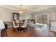 Cozy living room area with hardwood floors and a large window at 8923 Meadow Vista Rd, Charlotte, NC 28213