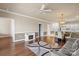 Bright living room with hardwood floors, fireplace, neutral tones, and open layout at 8923 Meadow Vista Rd, Charlotte, NC 28213