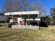 Carport in backyard with a covered area and partial lattice surround at 1 Barrow St, Rock Hill, SC 29730