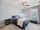 Cozy bedroom with soft carpeting, ceiling fan, and natural light, creating a peaceful retreat at 1008 Hills Oak Ln, Charlotte, NC 28269