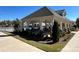 Attractive outdoor clubhouse with stone accents, stylish seating, and easy access to the community pool at 1008 Hills Oak Ln, Charlotte, NC 28269