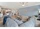 Inviting living room with a cozy sectional sofa, wood accents, and seamless flow to the kitchen at 1008 Hills Oak Ln, Charlotte, NC 28269