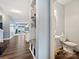 Hallway powder room with a pedestal sink and neutral paint at 1008 Hills Oak Ln, Charlotte, NC 28269