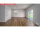 Spacious living room with sliding glass doors that offer backyard access and natural light at 11217 Cardinal Creek Ave, Charlotte, NC 28215