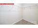 Walk-in closet with shelving, providing ample storage space for clothes and accessories at 11225 Cardinal Creek Ave, Charlotte, NC 28215