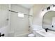 Bright bathroom with a tiled shower/tub, white vanity, and modern fixtures at 113 Brawley St, Chester, SC 29706