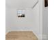 White walled room with hardwood flooring and a window at 121 Alexis Forest Dr, Stanley, NC 28164