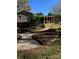 Charming backyard featuring a beautiful walkway, lush tropical plants and ample space for outdoor enjoyment at 121 Alexis Forest Dr, Stanley, NC 28164