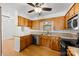 Traditional kitchen with stainless steel dishwasher and microwave and lots of storage at 121 Alexis Forest Dr, Stanley, NC 28164