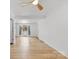 Bright living room with hardwood floors, a ceiling fan, and natural light at 121 Alexis Forest Dr, Stanley, NC 28164