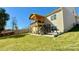 Expansive backyard with a multi-level deck, ideal for outdoor entertaining and relaxation at 12508 Asbury Chapel Rd, Huntersville, NC 28078