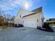 A two car attached garage at 12508 Asbury Chapel Rd, Huntersville, NC 28078