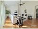 Spacious living room with hardwood floors, a fireplace, and neutral decor at 12508 Asbury Chapel Rd, Huntersville, NC 28078