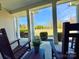 A relaxing porch with a beautiful view, adorned with rocking chairs at 12508 Asbury Chapel Rd, Huntersville, NC 28078