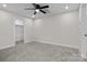 Spacious bedroom with plush carpet and a ceiling fan at 127 Mills Garden Rd, Statesville, NC 28625