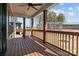 Covered wooden deck features wooden support beams and railings with natural exterior views at 127 Mills Garden Rd, Statesville, NC 28625