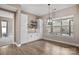 Cozy dining area with built-in cabinets, shelving, and a view of the backyard at 131 Chimney Rock Ct, Denver, NC 28037