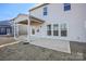 Backyard view features a covered patio area extending from the home at 13729 Roderick Dr # 188, Huntersville, NC 28078
