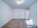 Bedroom featuring neutral walls and carpet at 15040 Cordelia Dr, Charlotte, NC 28278