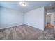 Bedroom featuring neutral walls and carpet at 15040 Cordelia Dr, Charlotte, NC 28278