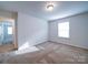 Bedroom featuring neutral walls and carpet at 15040 Cordelia Dr, Charlotte, NC 28278