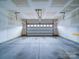 Spacious two-car garage with an automatic door, offering ample parking and storage space at 15040 Cordelia Dr, Charlotte, NC 28278