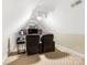 Cozy bonus room with vaulted ceiling, TV, and comfortable seating at 16160 Hopewell Church Rd, Midland, NC 28107