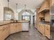 Open kitchen with granite countertops, stainless steel appliances, and view into the breakfast nook at 16160 Hopewell Church Rd, Midland, NC 28107