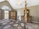 Comfortable main bedroom featuring a four-poster bed, dresser, and access to an outdoor patio at 16160 Hopewell Church Rd, Midland, NC 28107